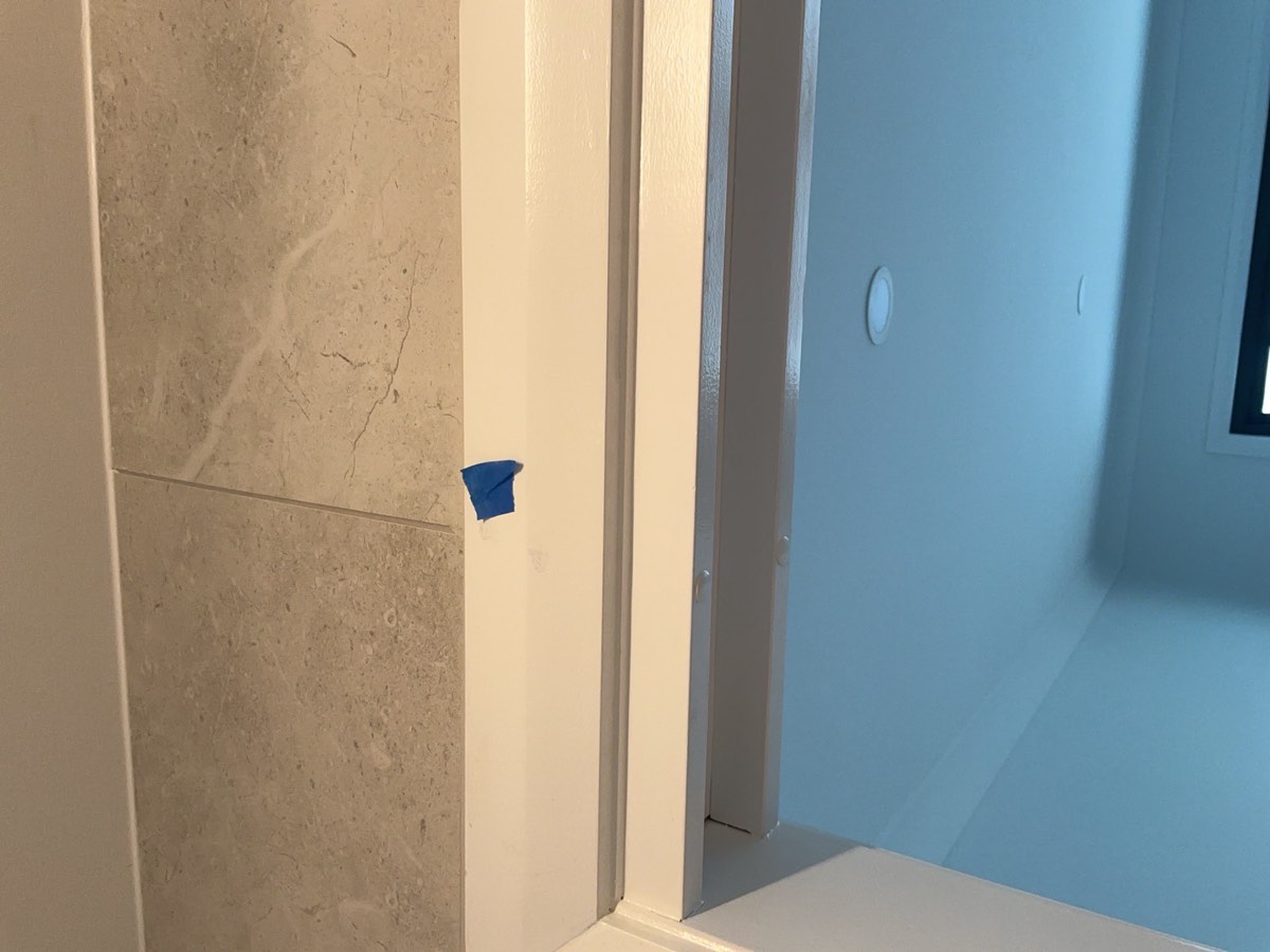 Ensuite painting, recorded at a handover inspection in Austral