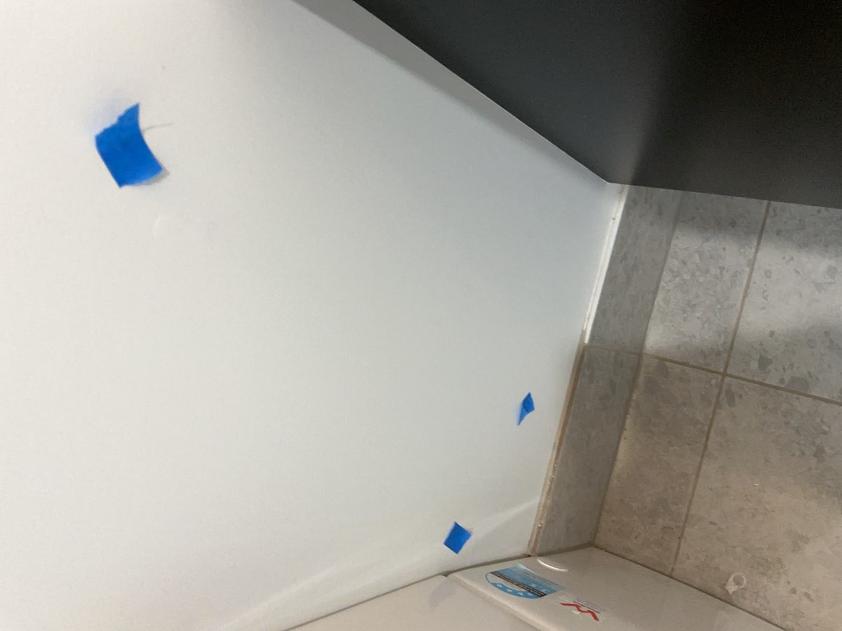 Powder room painting, recorded at a handover inspection in Oran Park